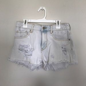 White denim distressed shorts