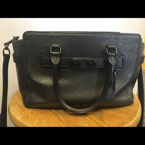 Coach black bag in pebble leather