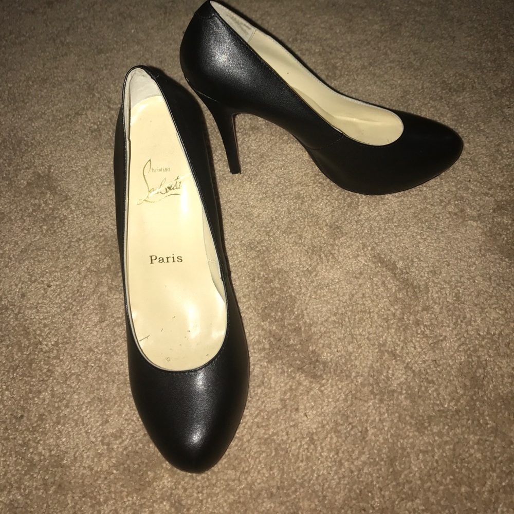 Not Authentic "Louboutin" shoes.