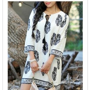 Tan ans brown feather printed dress