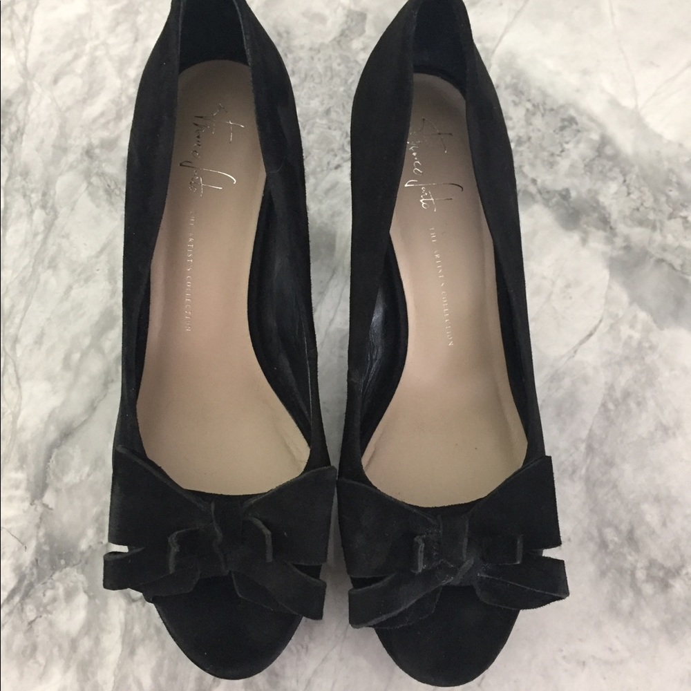 Black suede heels with bows