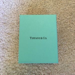 A Tiffany & Co. real silver ring with a sapphire