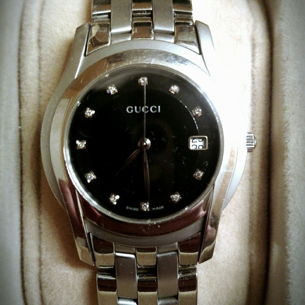 Gucci 5500M watch with diamond accents