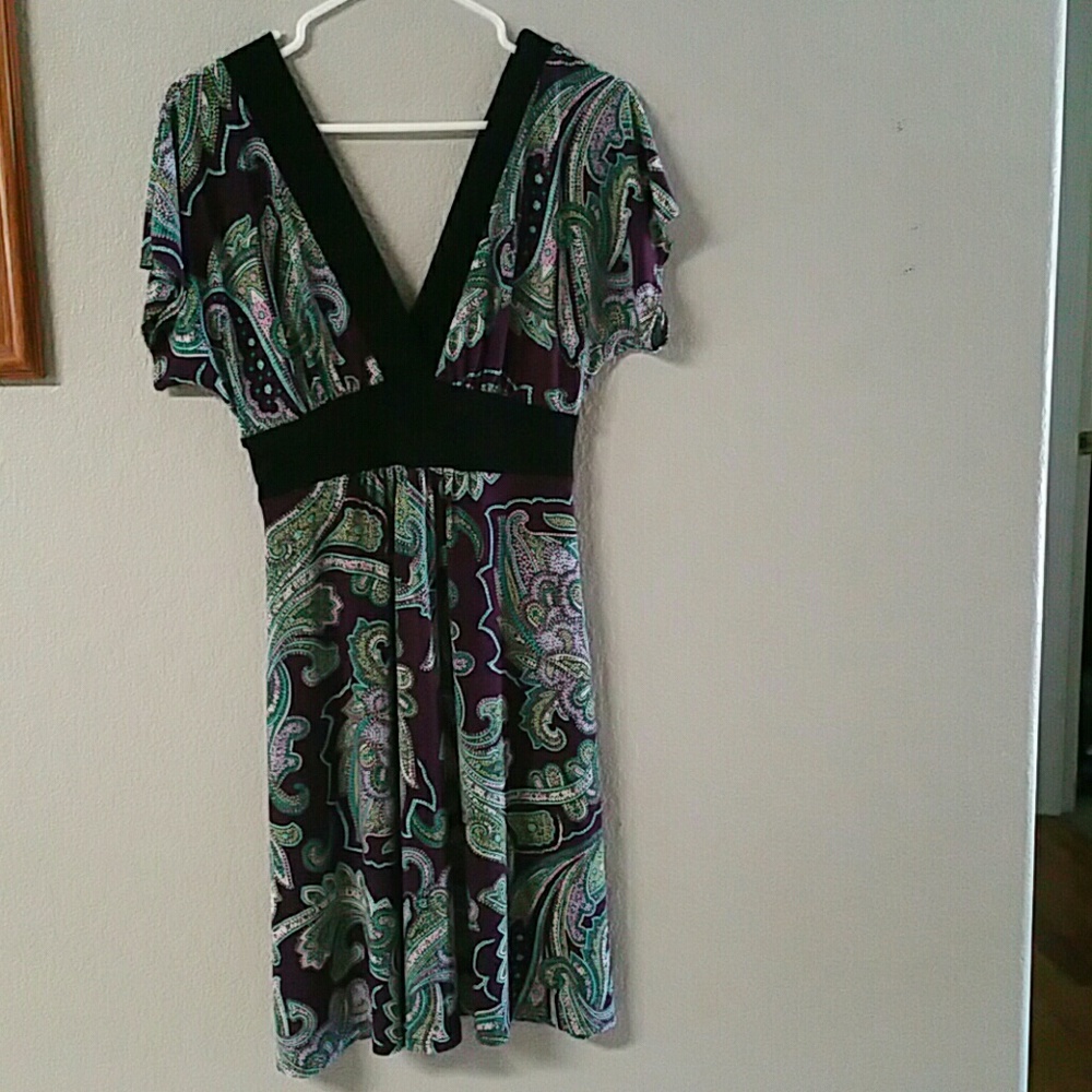 Flirting dress 38 inches long and 18 arm to arm