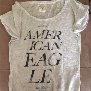 Off white/grey tee shirt, see through material