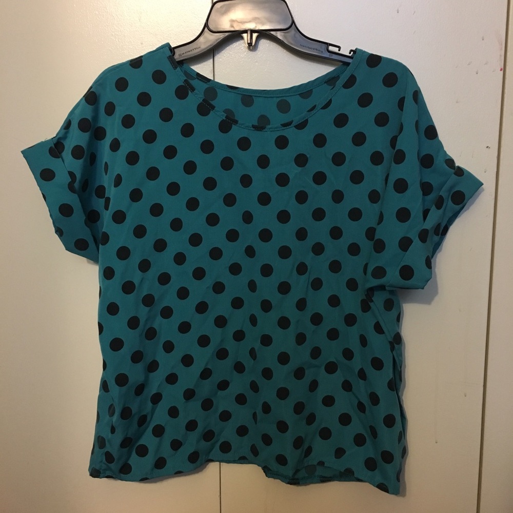 large loose dark green polta dot shirt
