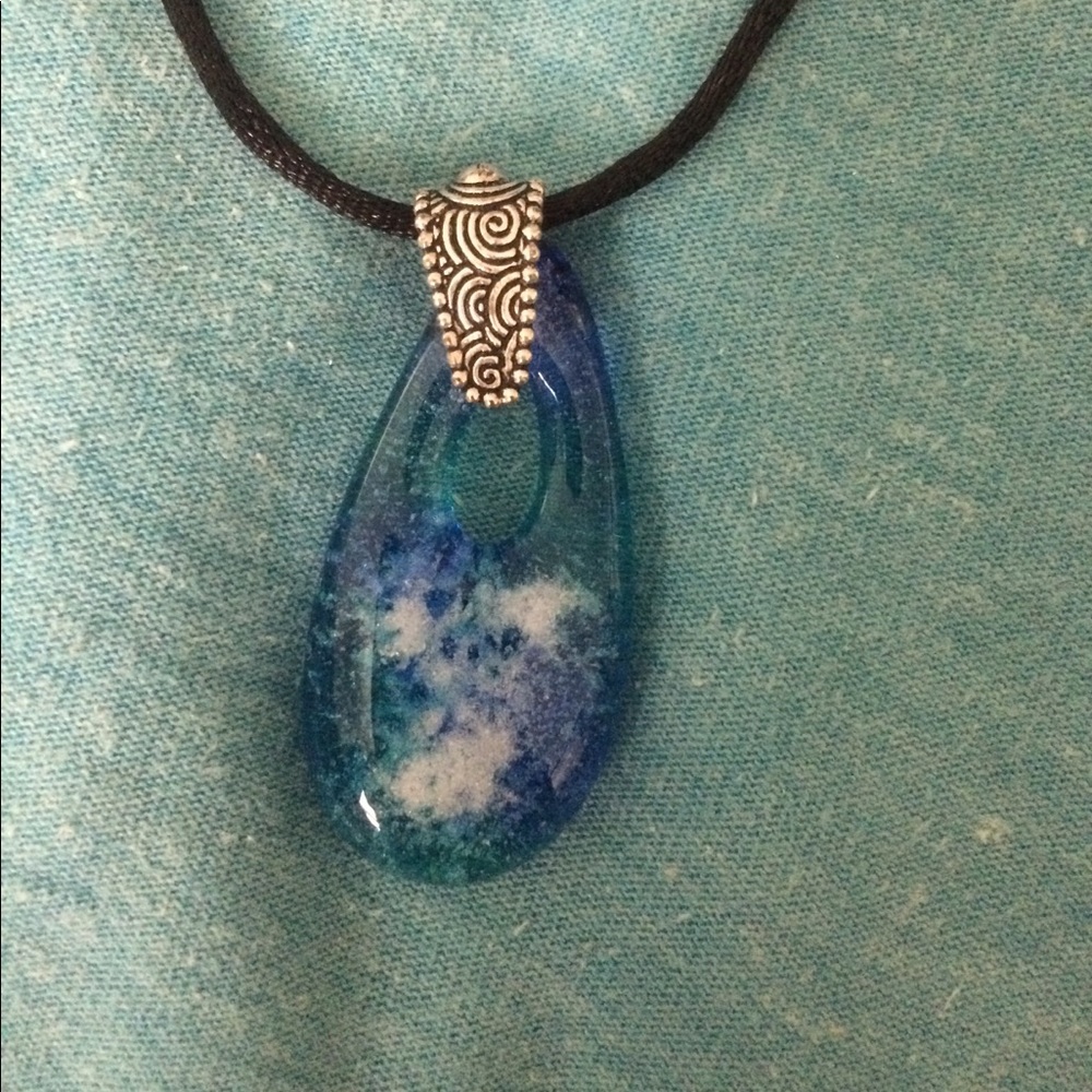 Stone necklace on black rope necklace
