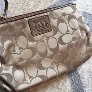 Coach bronze wristlet