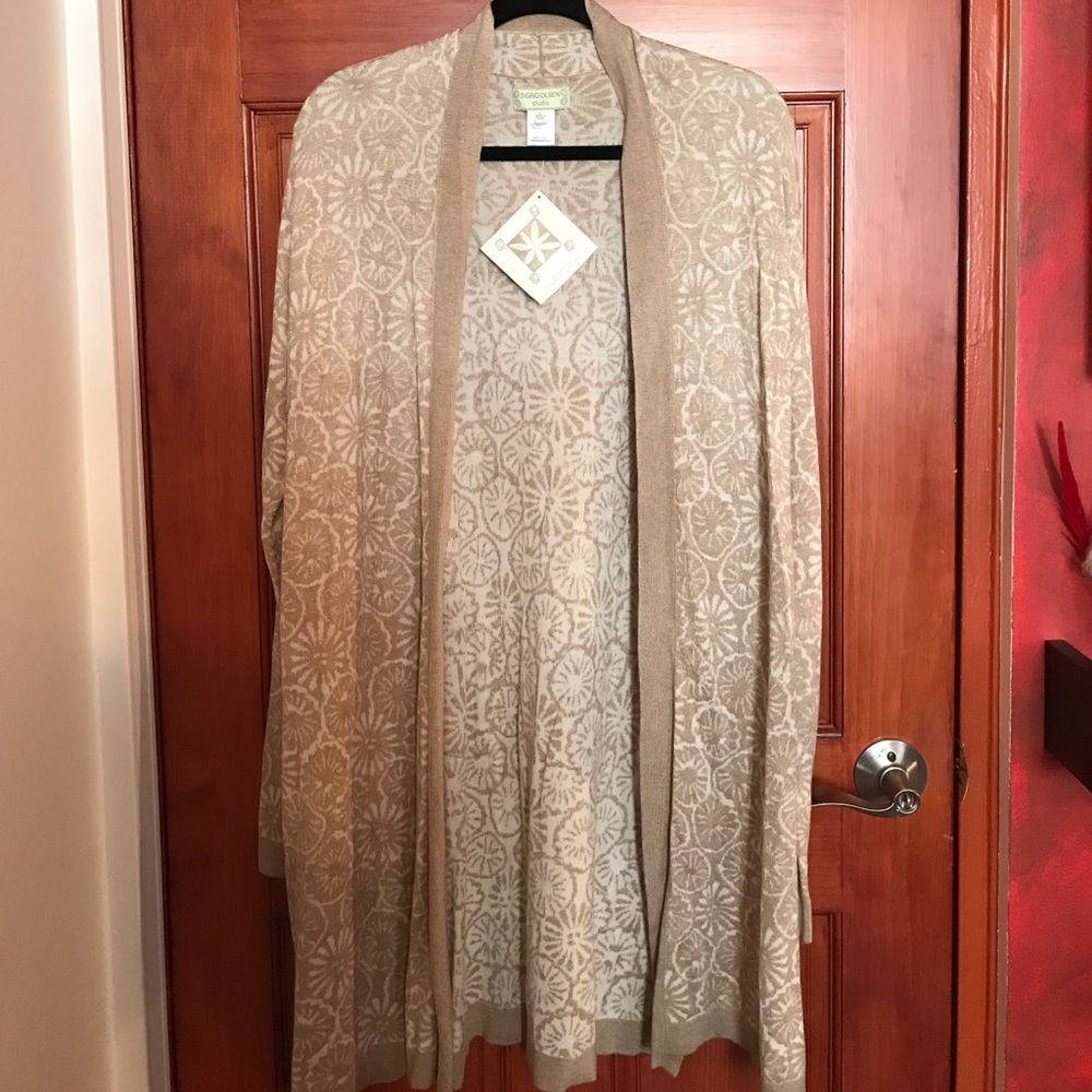 Reversible brand new cardigan, size L.