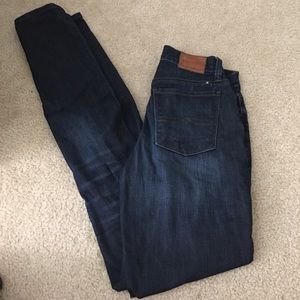 Dark wash skinny mid-rise jeans