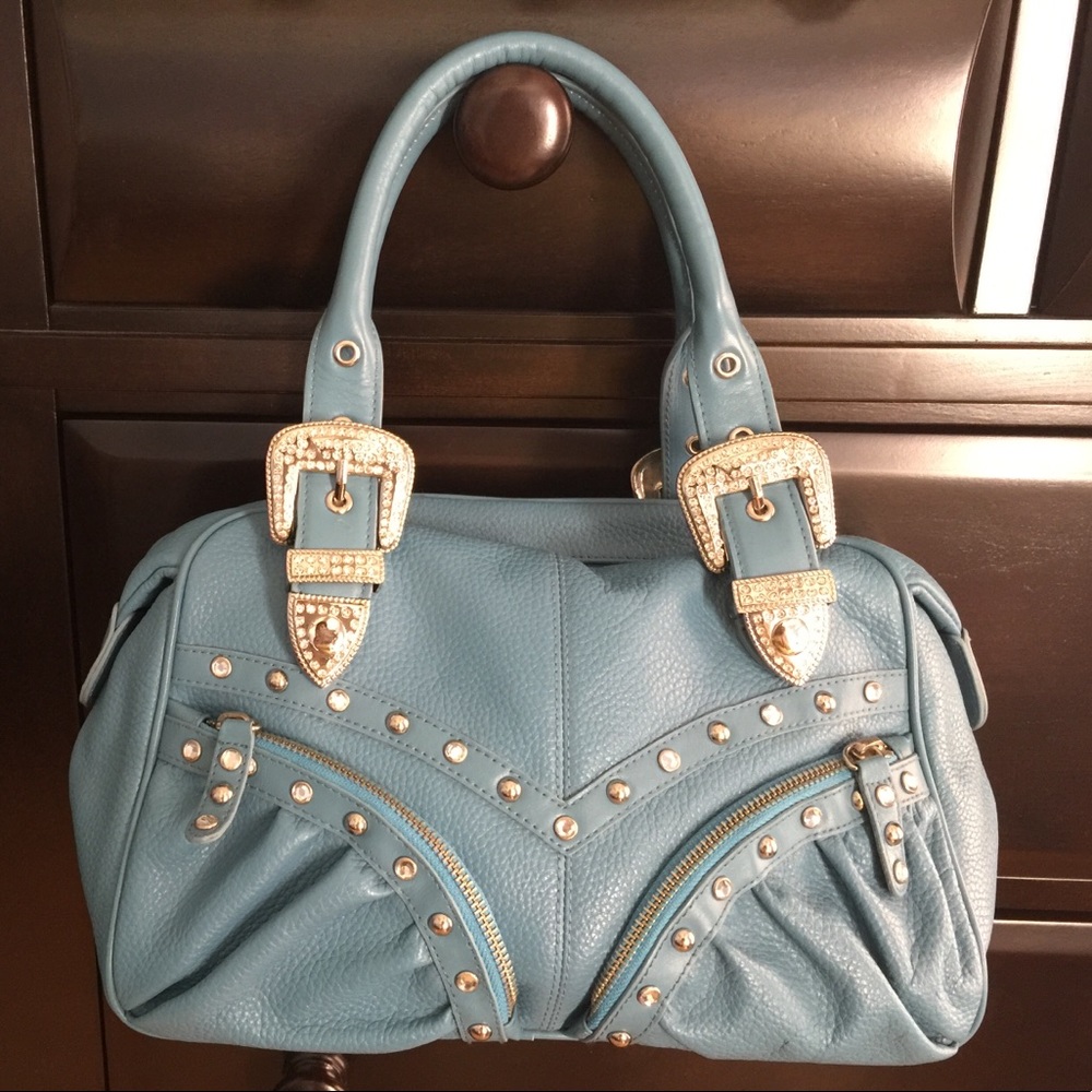 Charm and luck leather handbag
