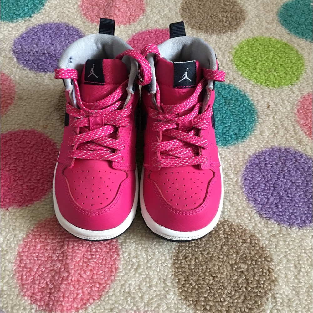Pink and Black Jordan sneakers