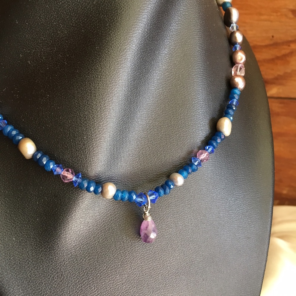 Elegant blue and purple statement necklace.