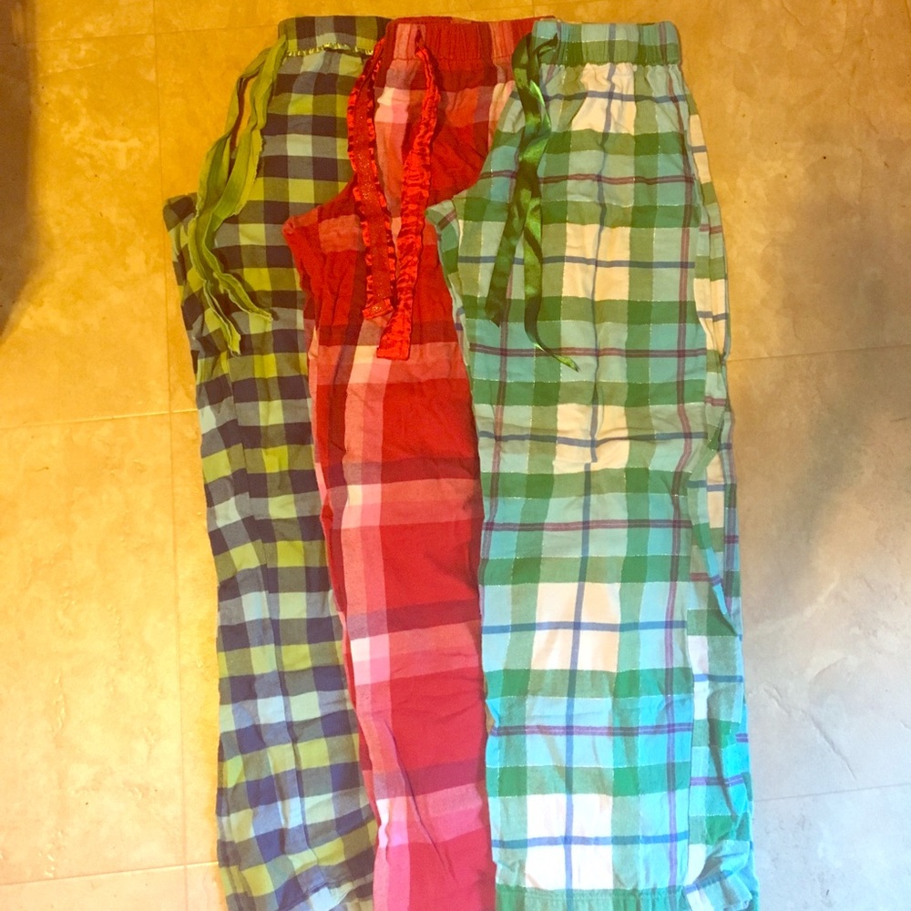 Three different, very colorful pajama pants