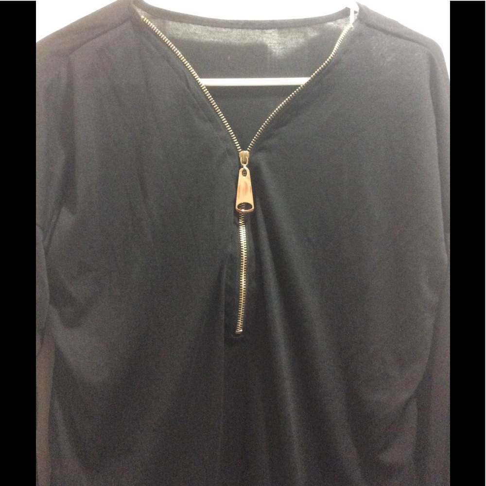 Black tunic with gold accent zipper