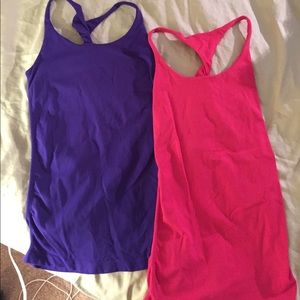 Pink and purple Bebe twist back tanks