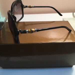 Gucci oversized sunglasses with bamboo temple.