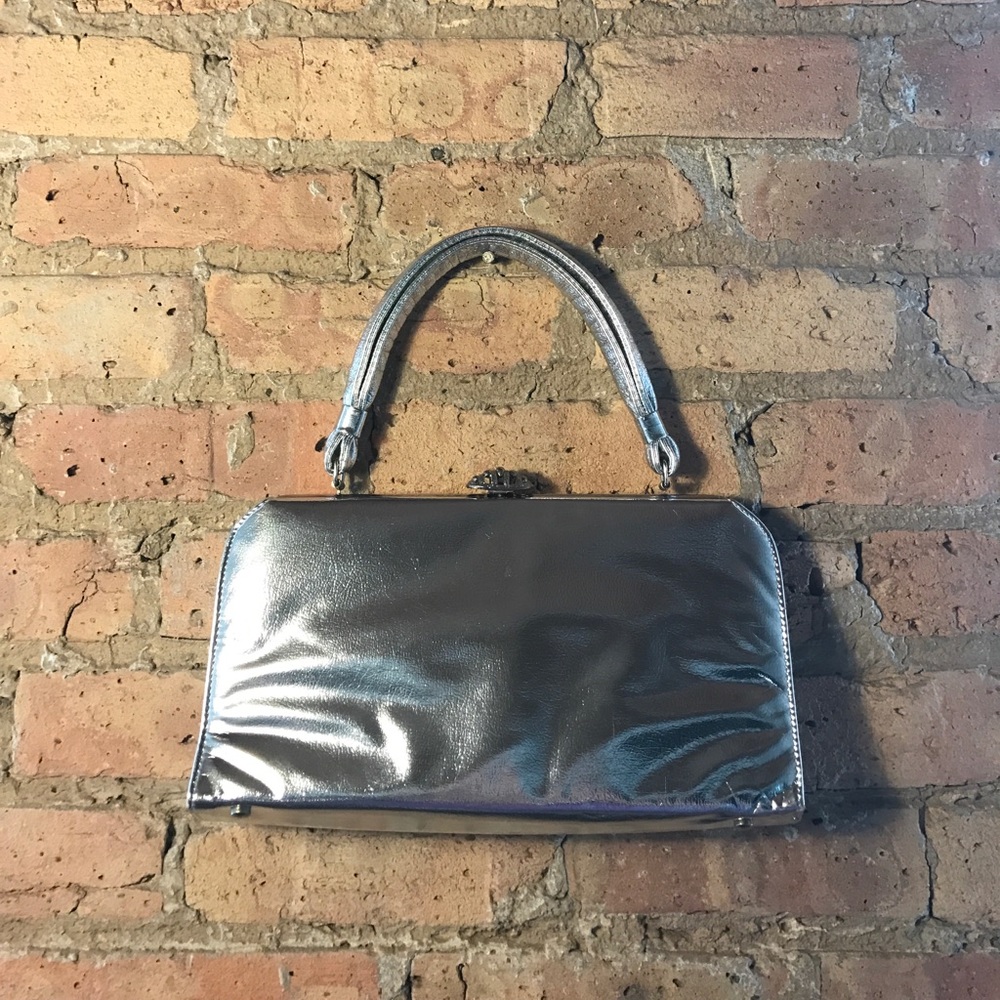 Vintage Silver Handbag with Single Snap Closure