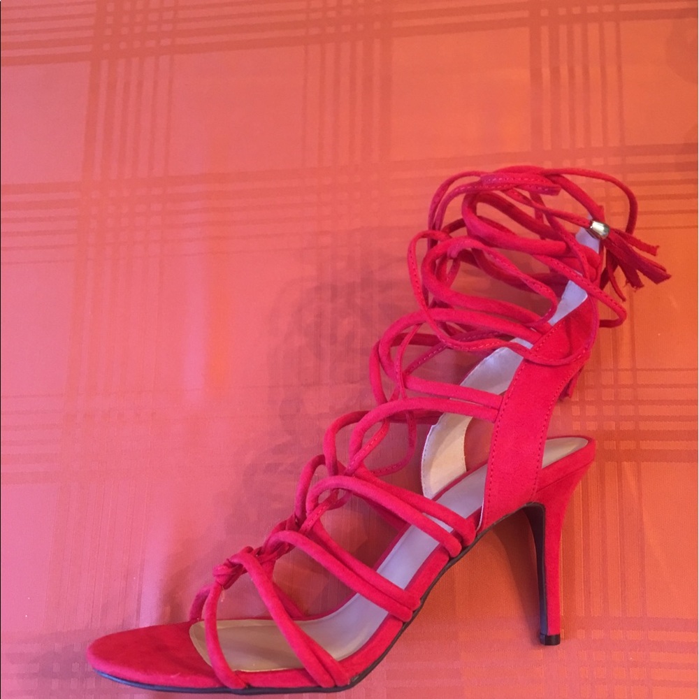 Red lace up heels.