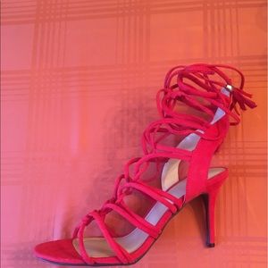 Red lace up heels.