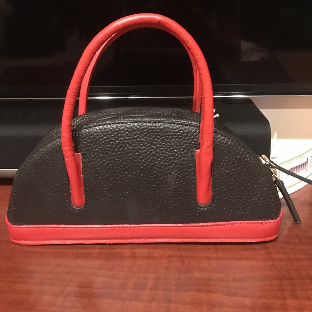 Cleo & Patek Handbag