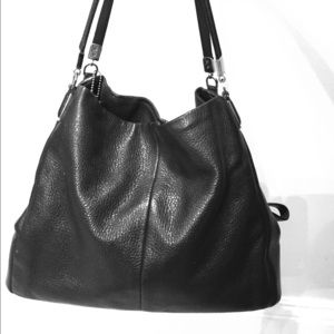Black leather COACH bag.