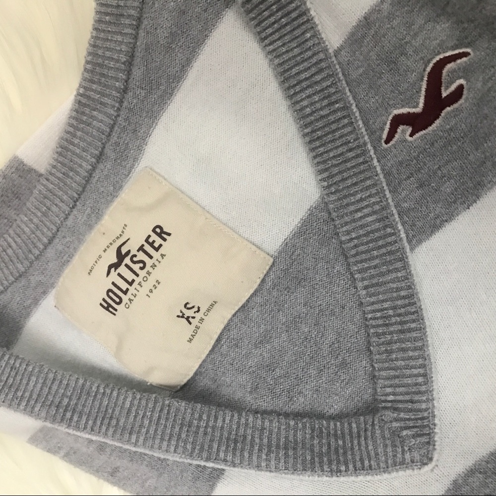Hollister v neck gray and white striped sweater!