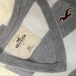 Hollister v neck gray and white striped sweater!