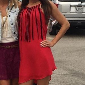 Red dress with black fringe