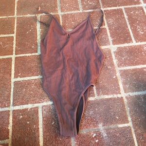 Tight fitting bodysuit