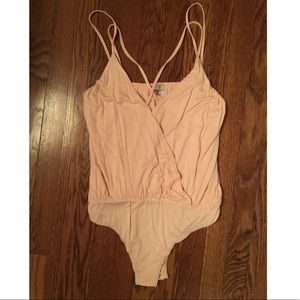 Never worn blush tobi bodysuit!