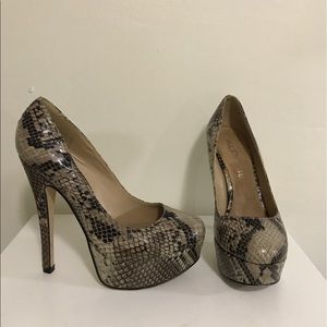 Aldo faux snakeskin platform pumps