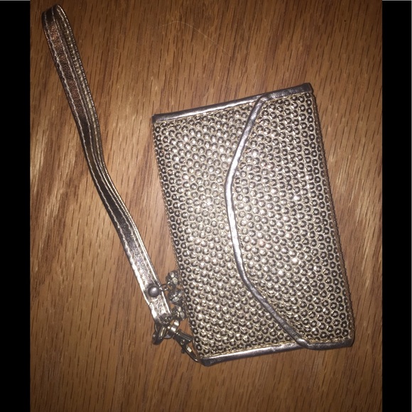 LC Lauren Conrad Accessories - Gold iphone4 wristlet. Lauren Conrad by Mark ✨