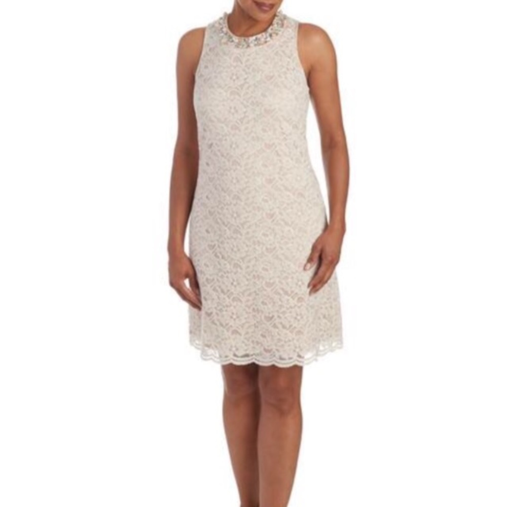 Beautiful flattering ivory dress by Jessica H