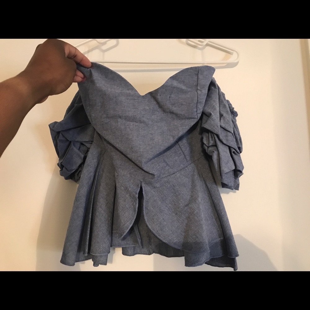 Blue peplum top from Akira