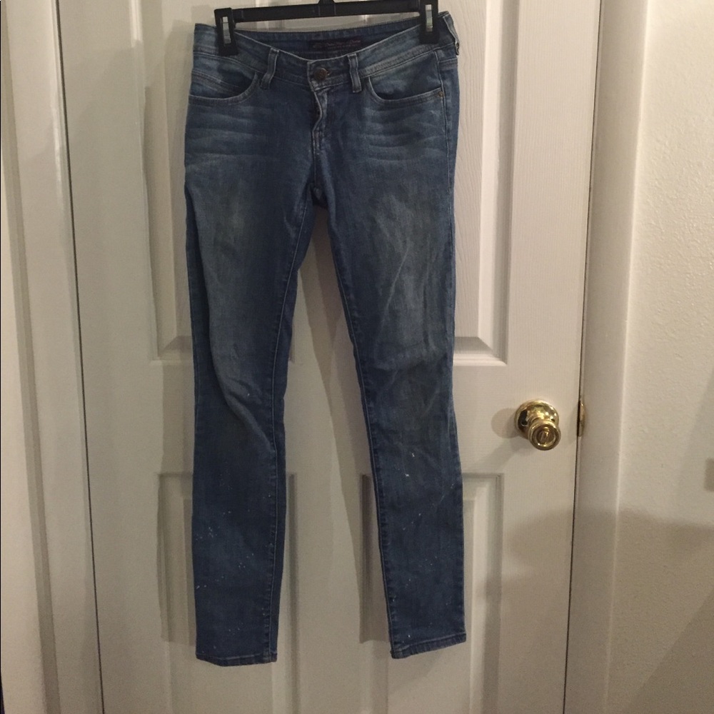 Divine Rights of Denim paint splattered jeans
