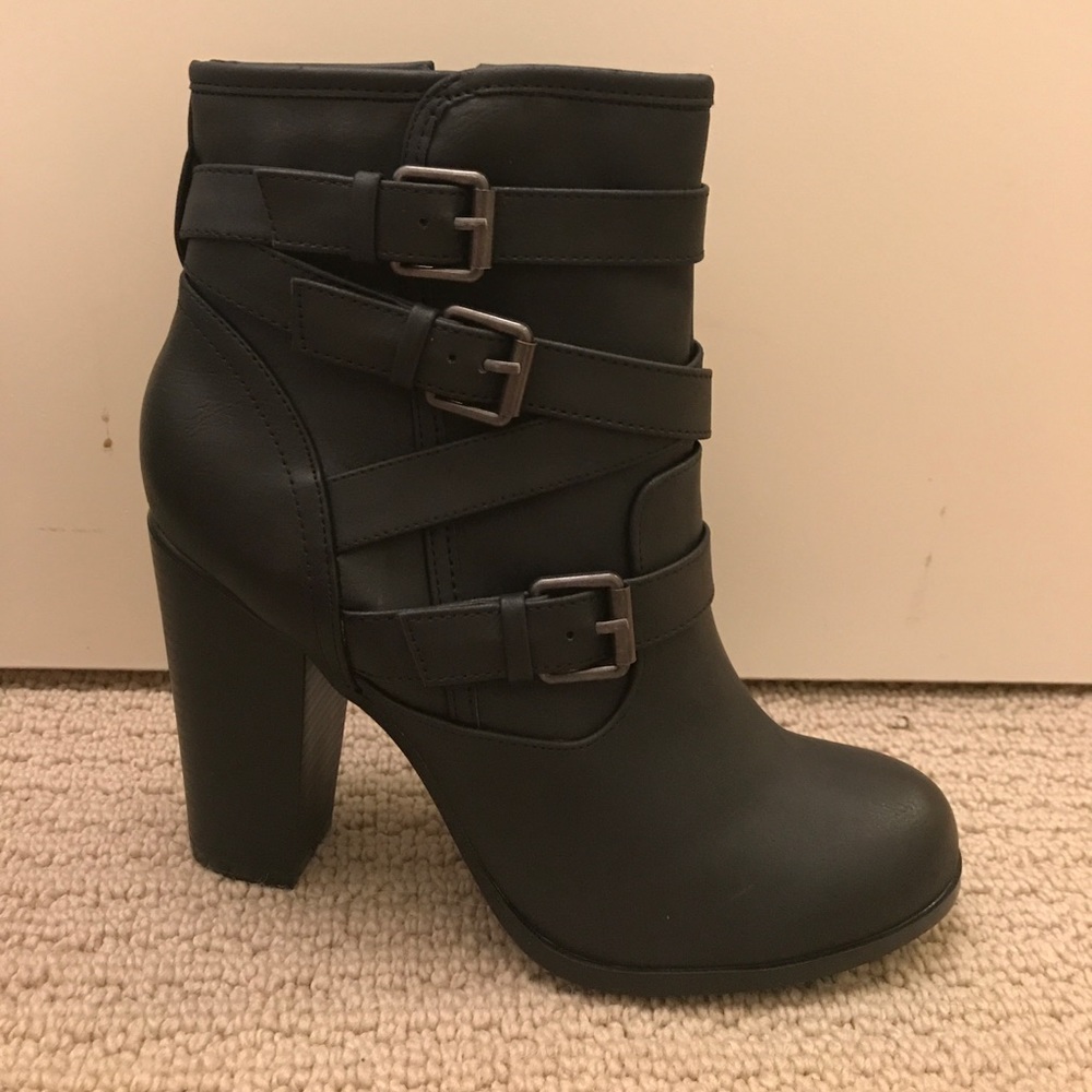 Never been worn black boots