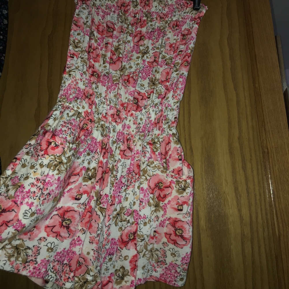 Pink and white floral romper with pockets