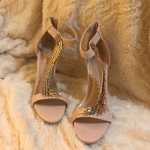 Nude heels with gold embellishments