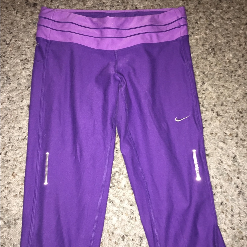 Nike dri fit size medium running pants.