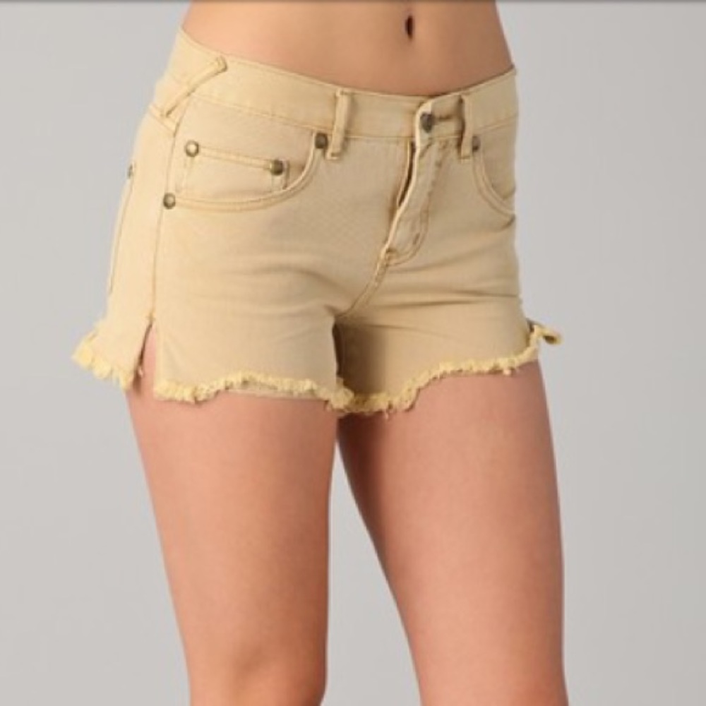 Free People tan rugged ripped cutoff shorts