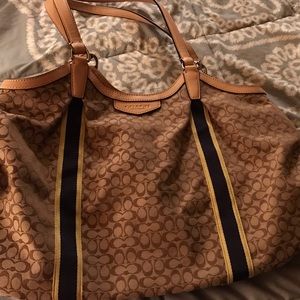 A coach purse which is has been rarely used.