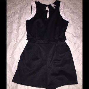 Black keyhole romper with feaux leather detail