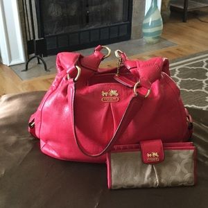 Coach fuchsia shoulder bag with wallet.