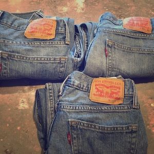 Three pairs of Levi's. Selling together as one.
