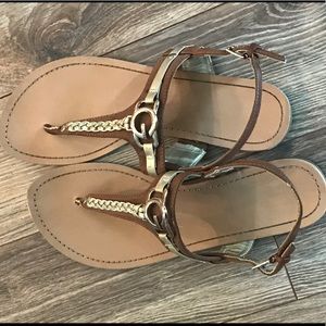 Brown and gold sandals