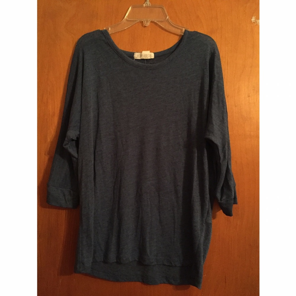 More navy blue in person. 3 quarter long sleeve