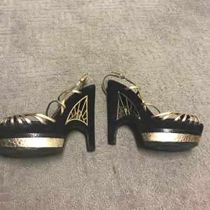 Sam elderman black and gold heels