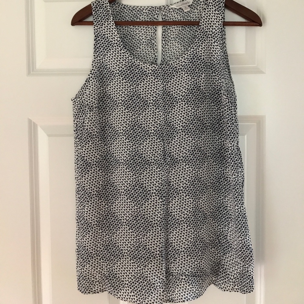 Blue and white sleeveless blouse