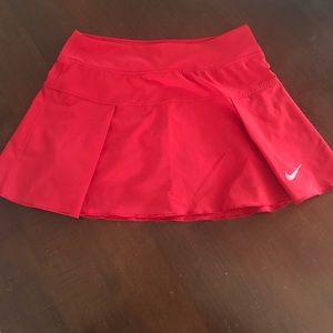 Red Nike running and tennis skirt